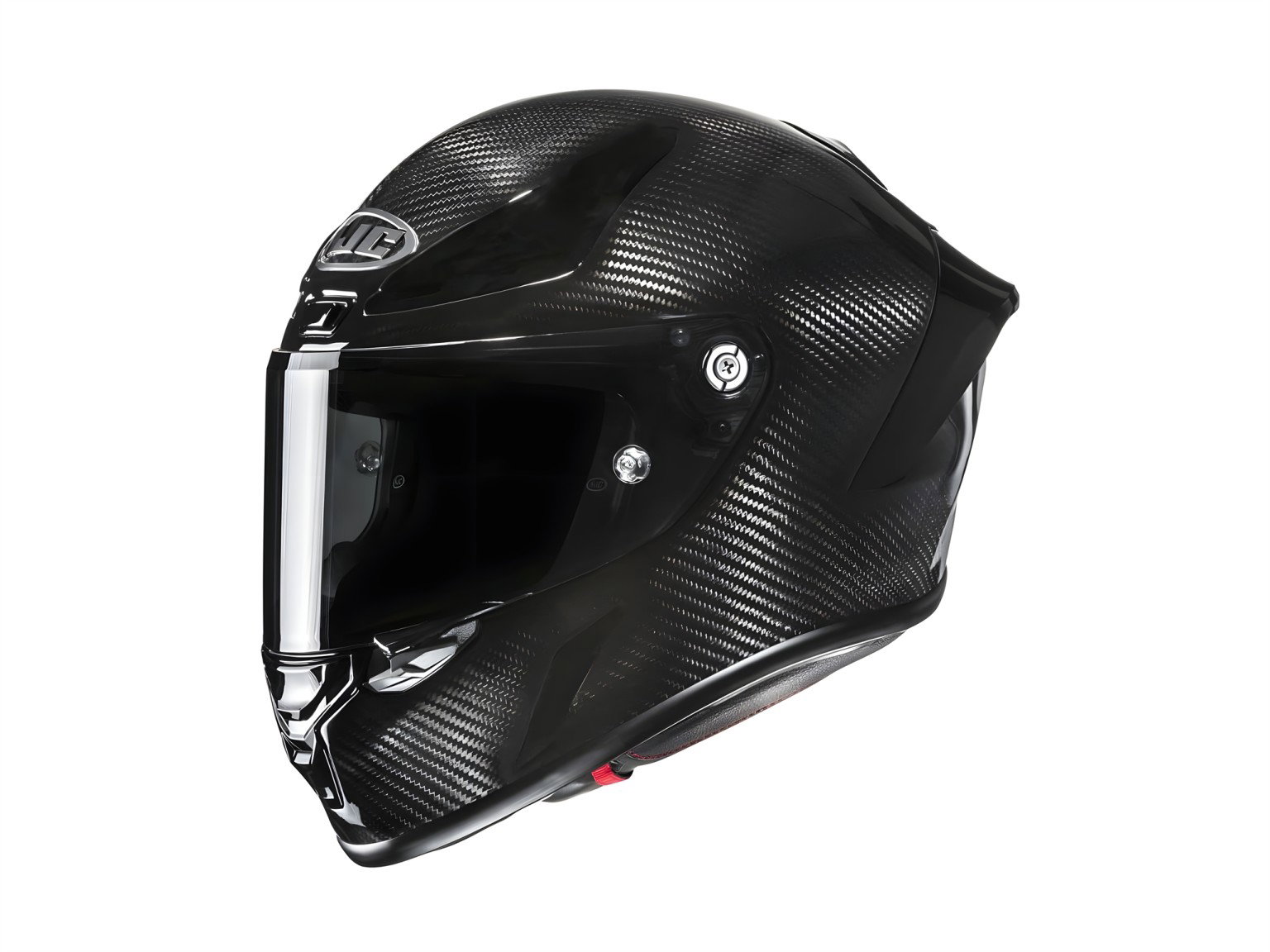 HJC RPHA 1 V2 Carbon: MotoGP Helmet with FIM-02 Standard from 749 Euros HJC RPHA 1 V2 Carbon 2026 – Dreiviertelansicht von vorn links, dunkles Visier, Metallvisierverschluss, sichtbare Carbon-Faser-Struktur, weißer Hintergrund