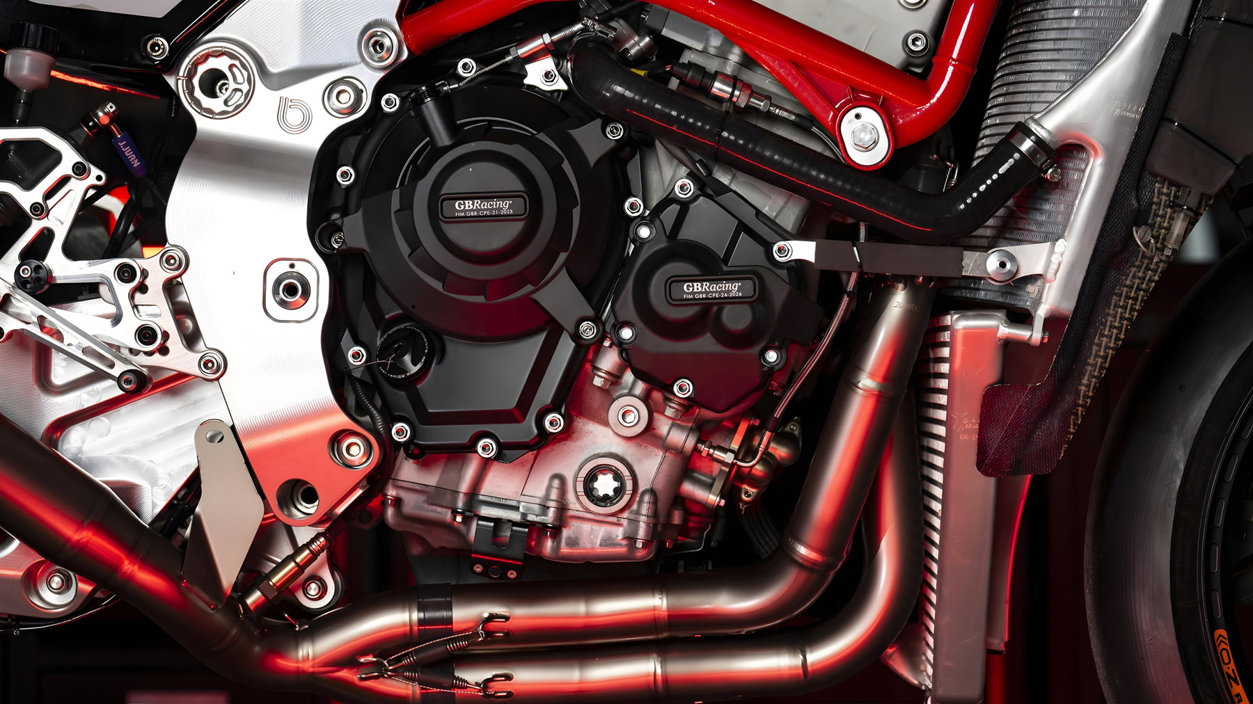 Bimota KB998 Rimini Elite 2026 – close-up of the Kawasaki ZX-10RR engine with GBRacing protection covers, clutch housing and titanium headers