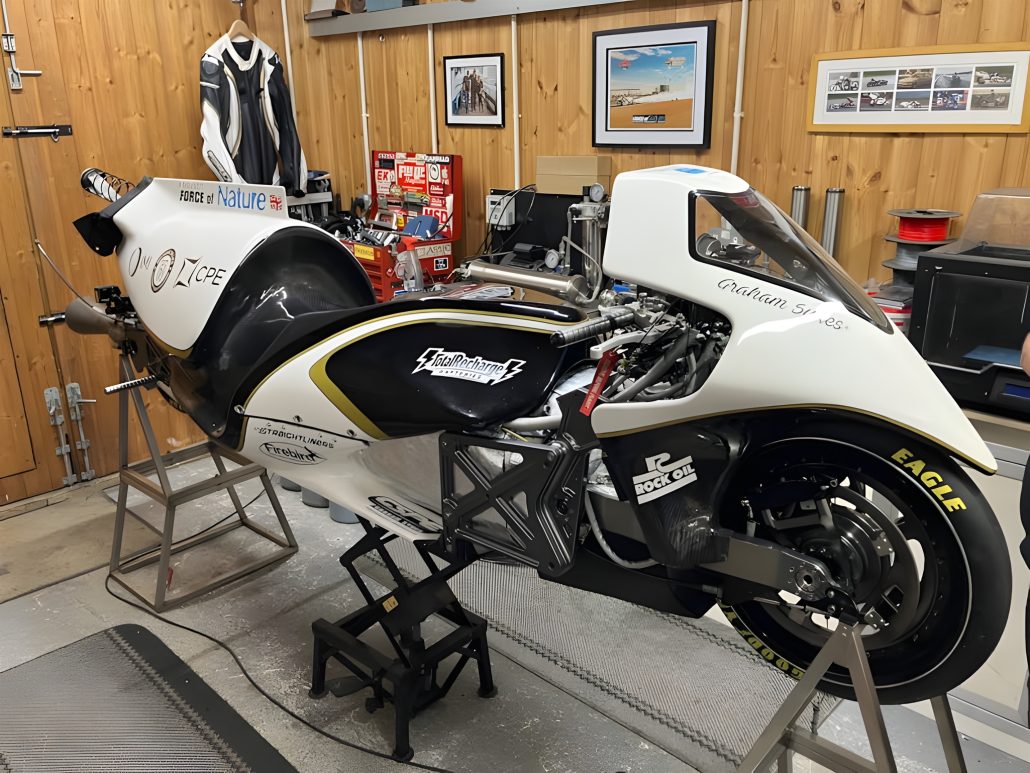 Force of Nature rocket motorcycle – right-side workshop view showing the steam pressure vessel and chassis structure