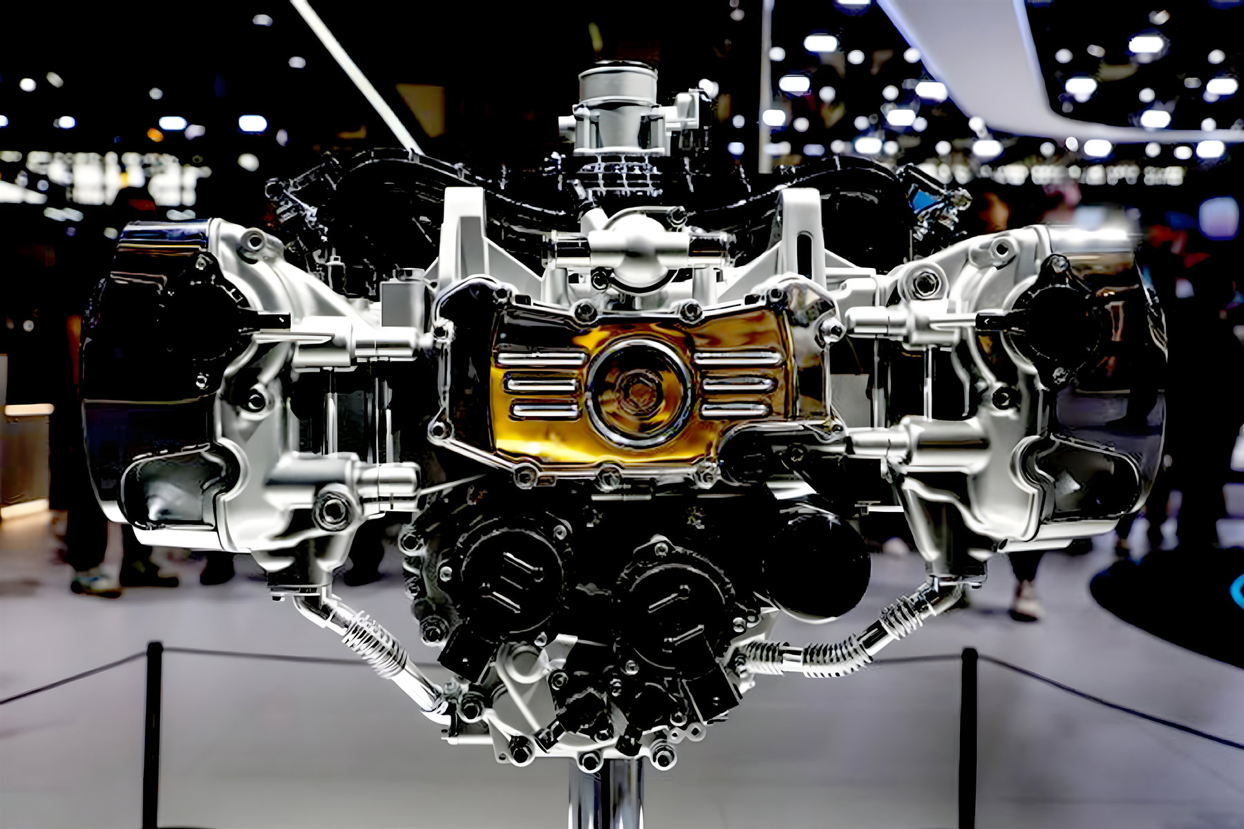 GWM Souo S2000 - 2.0-liter V8 boxer engine close-up with silver valve covers, four exhaust pipes and cooling fins