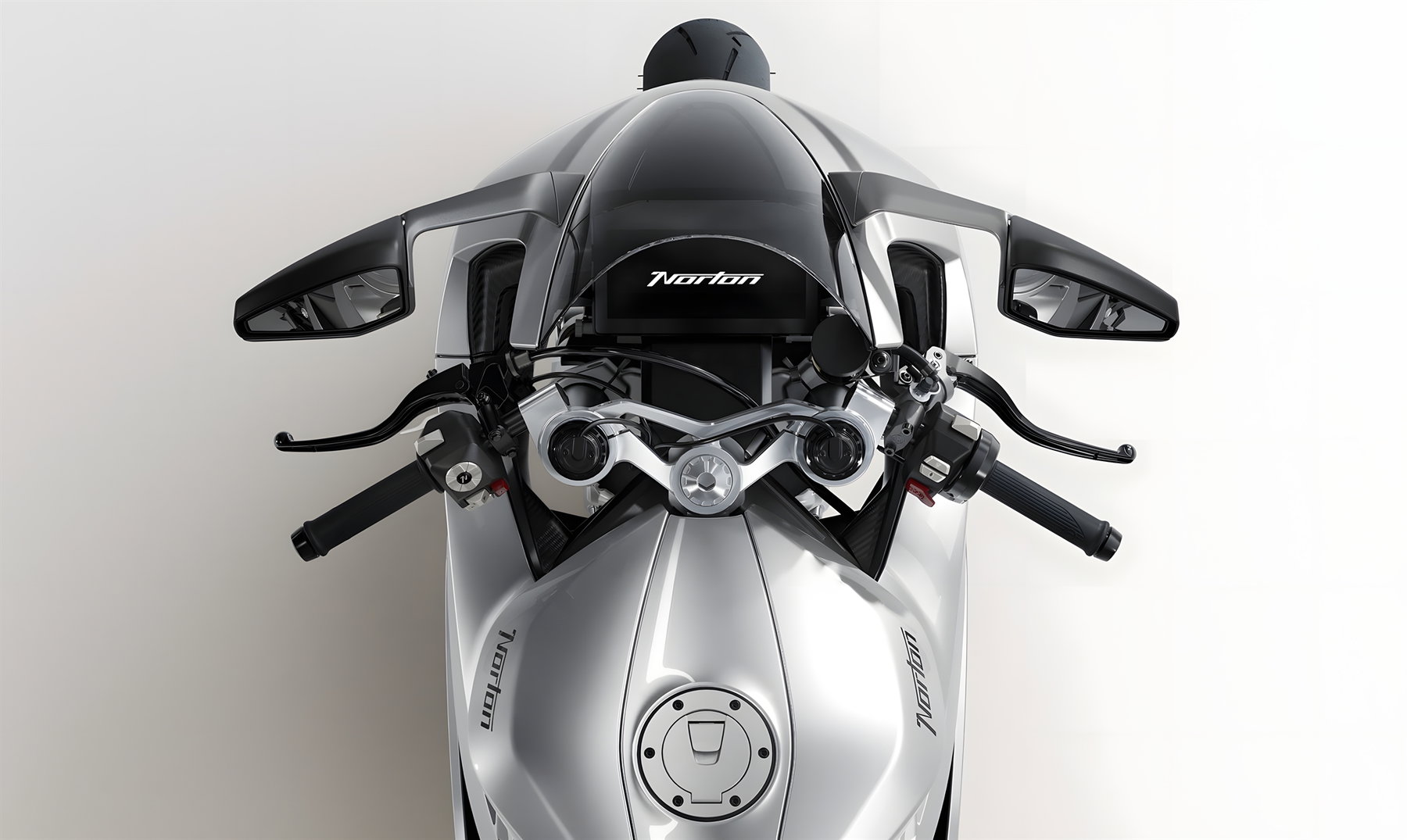 Norton Manx R 2026 – Cockpit-Perspektive von oben mit Gabelbrücke, Windschild und TFT-Display