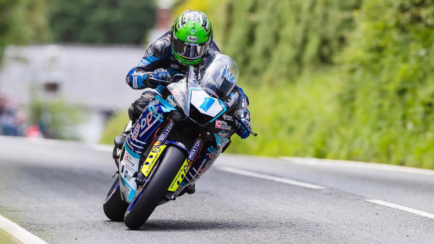 Mike Browne wearing number 1 on the Russell Racing Yamaha at full speed between hedgerows on the Mountain Course - Monster Energy Supersport TT Race 2, Isle of Man TT 2026
