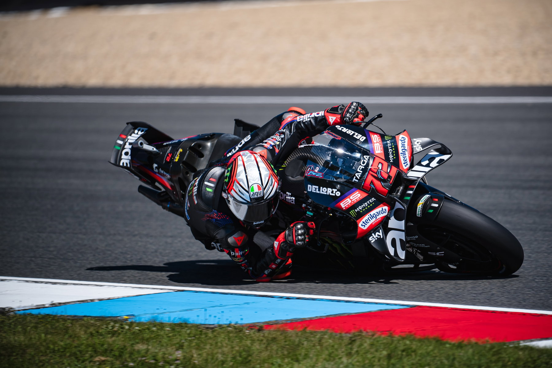Bagnaia wins Brno Sprint: Bezzecchi crash costs championship points 4 Marco Bezzecchi leaning deep on the Aprilia RS-GP – MotoGP Czech GP Brno 2026