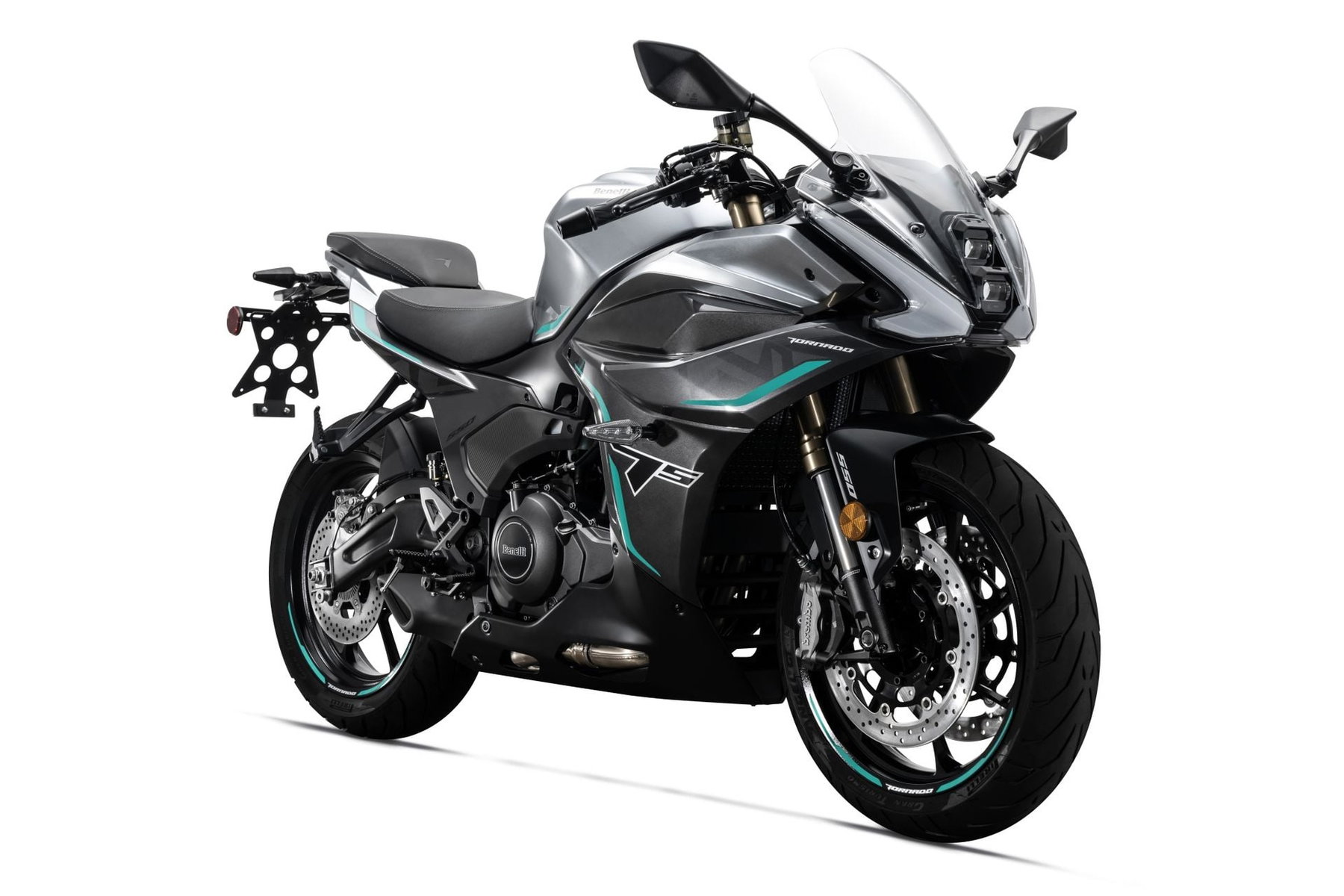 Benelli Tornado 550: In Europe Since 2025, Now Launching in the US for $5,999 2 Benelli Tornado 550 2026 in Tech Silver, studio shot from the front right in three-quarter view: silver-grey front fairing with LED headlight, gold Marzocchi fork tubes, turquoise accents, isolated on a white background
