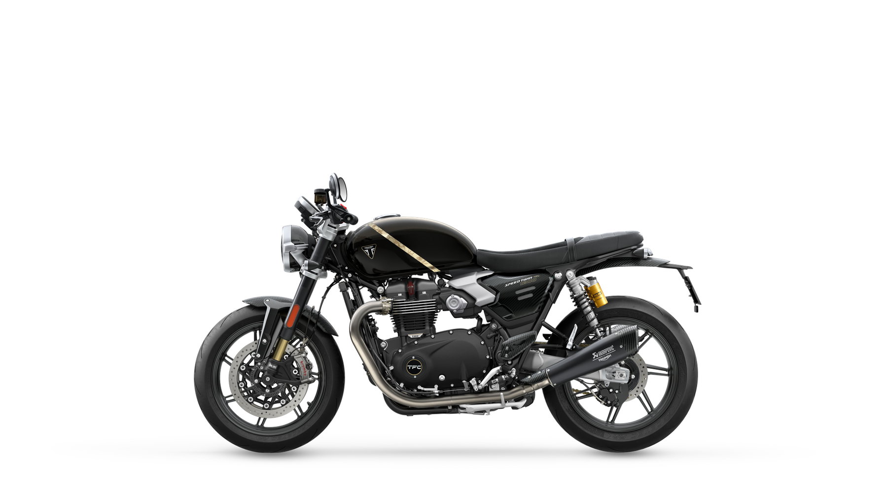Triumph Speed Twin 1200 TFC: 750er-Sonderserie mit Öhlins und Akrapovič 4 Triumph Speed Twin 1200 TFC 2027 – linke Seitenansicht im Profil im Betonstudio, Café-Racer-Silhouette mit goldenem Öhlins-Federbein und Akrapovič-Schalldämpfer